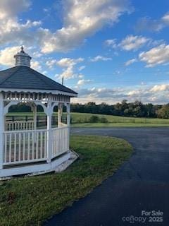 view of home's community with a gazebo and a lawn