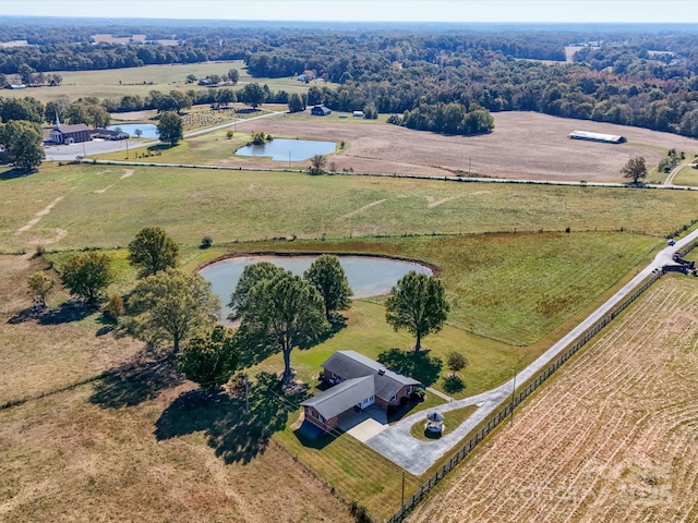 bird's eye view featuring a rural view and a water view