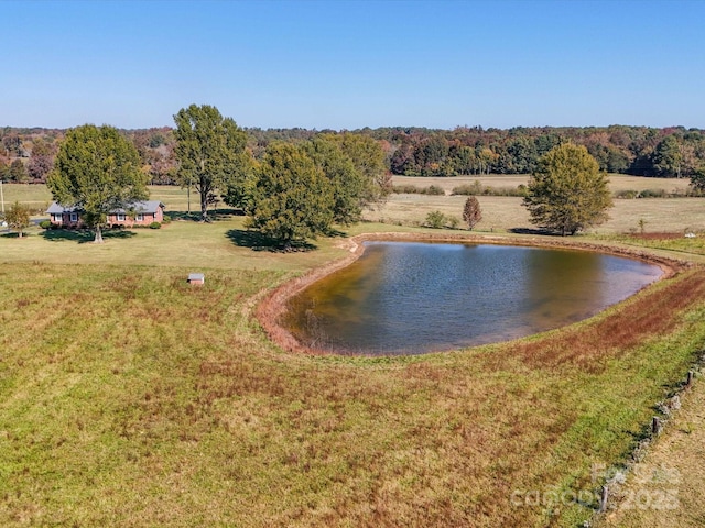 aerial view with a water view and a rural view