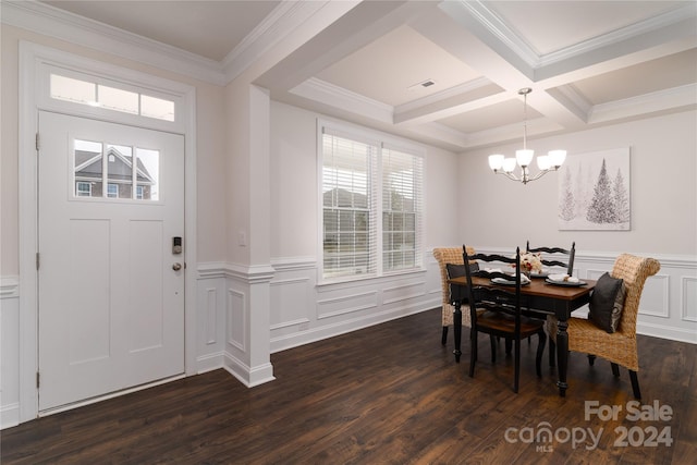 interior space featuring coffered ceiling, an inviting chandelier, dark wood-type flooring, and a healthy amount of sunlight