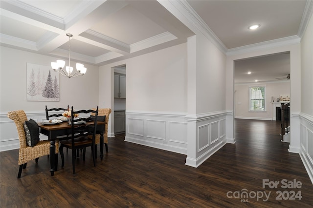 dining area with ceiling fan with notable chandelier, a fireplace, and dark hardwood / wood-style flooring