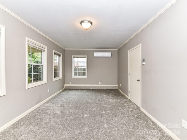 carpeted spare room with crown molding and a wall mounted air conditioner