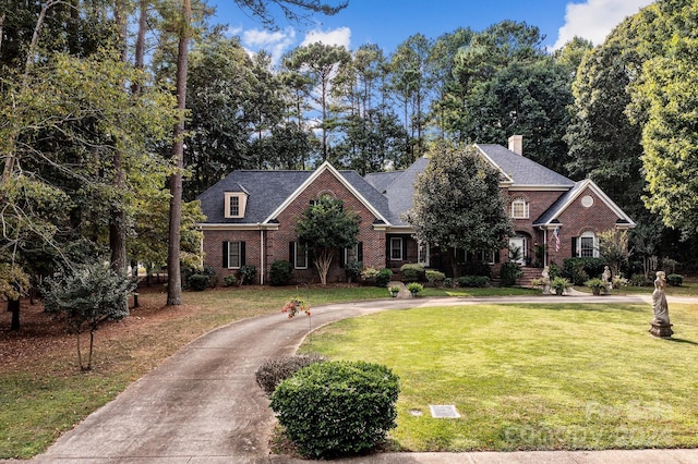 view of front of home with a front yard