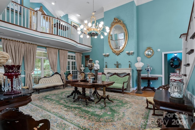 dining space featuring a notable chandelier, hardwood / wood-style floors, and high vaulted ceiling