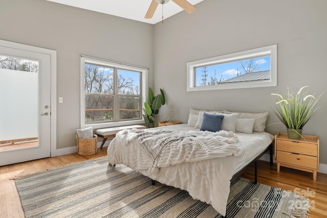 bedroom with hardwood / wood-style flooring and ceiling fan