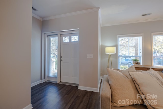 foyer featuring crown molding and dark wood-type flooring