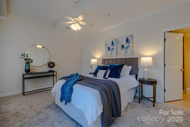 carpeted bedroom featuring ceiling fan and ornamental molding