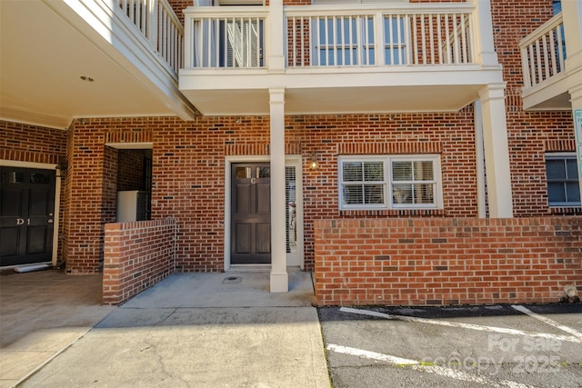 doorway to property with a balcony