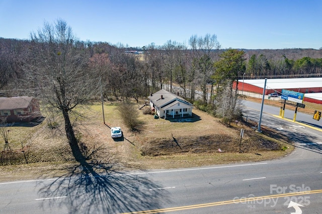 aerial view with a wooded view