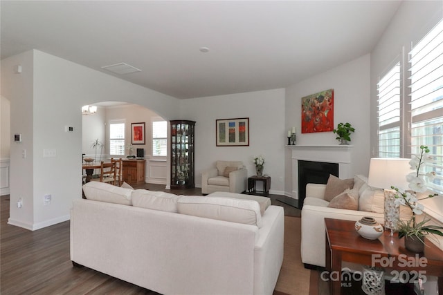 living room with dark wood-type flooring