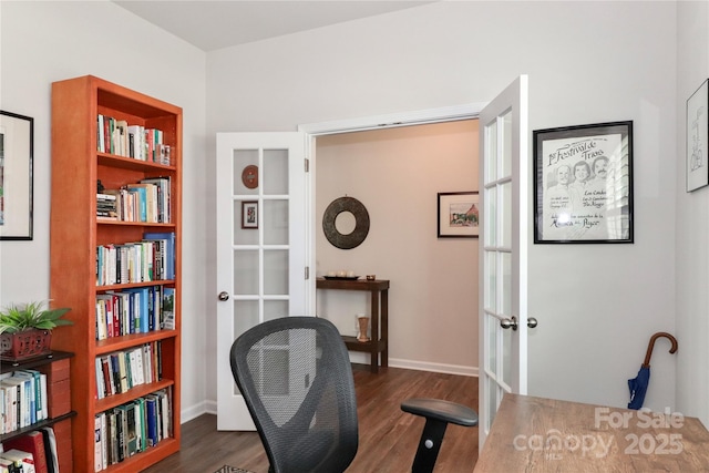 home office with french doors and dark hardwood / wood-style flooring