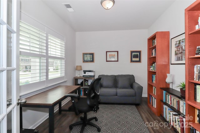 home office featuring dark hardwood / wood-style flooring