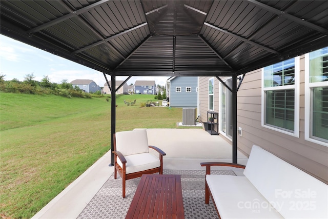 view of patio / terrace with a gazebo, an outdoor hangout area, and cooling unit