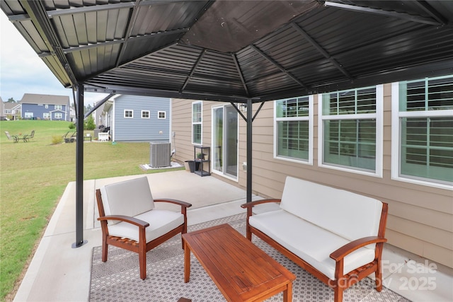 view of patio / terrace with an outdoor hangout area and cooling unit