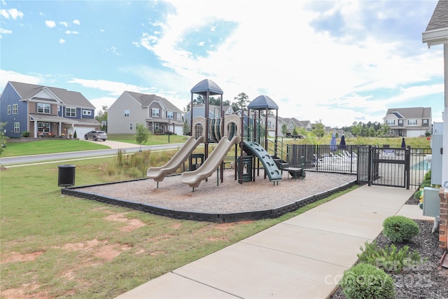 view of play area with a yard