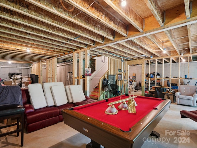 rec room with pool table and concrete floors