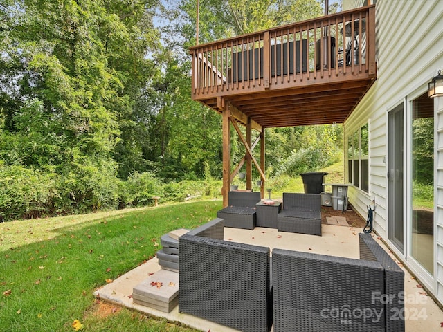 view of patio / terrace featuring a wooden deck and an outdoor hangout area