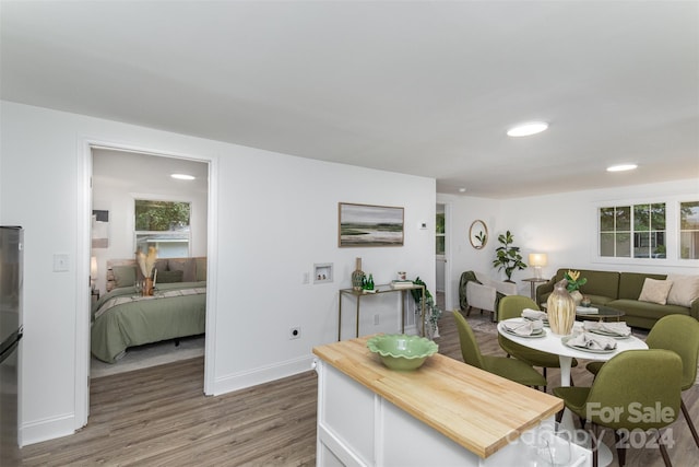 dining room with hardwood / wood-style floors