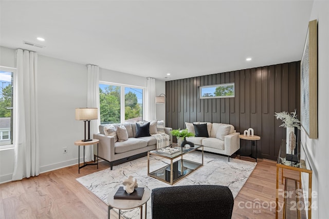 living room with light hardwood / wood-style floors