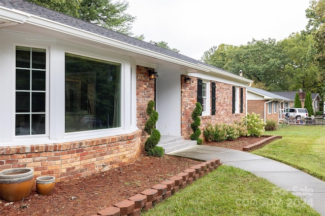 exterior space featuring a lawn