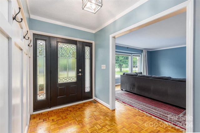 entryway featuring crown molding and light parquet floors