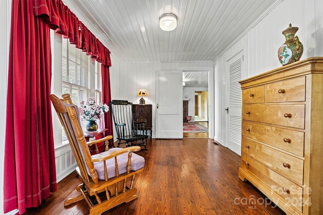 living area featuring dark wood-type flooring