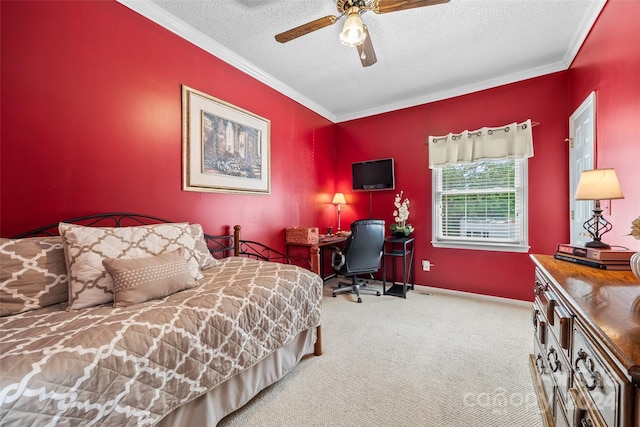 carpeted bedroom with a textured ceiling, ornamental molding, and ceiling fan