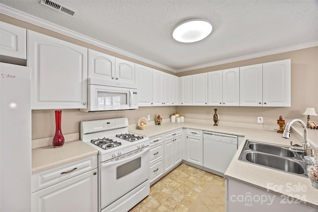 kitchen with white cabinets, sink, white appliances, a textured ceiling, and crown molding