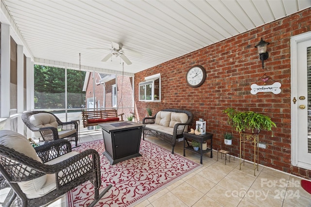 sunroom with wooden ceiling and ceiling fan