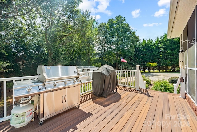 wooden terrace with grilling area