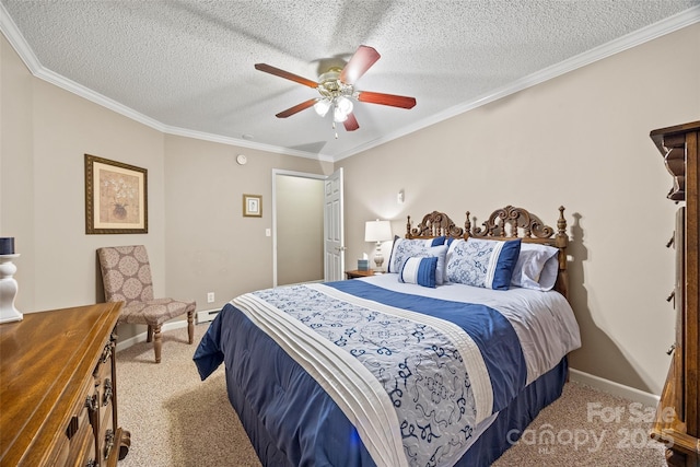 carpeted bedroom with a textured ceiling, ornamental molding, and ceiling fan