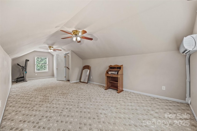 bonus room with a wall mounted air conditioner, vaulted ceiling, and light colored carpet