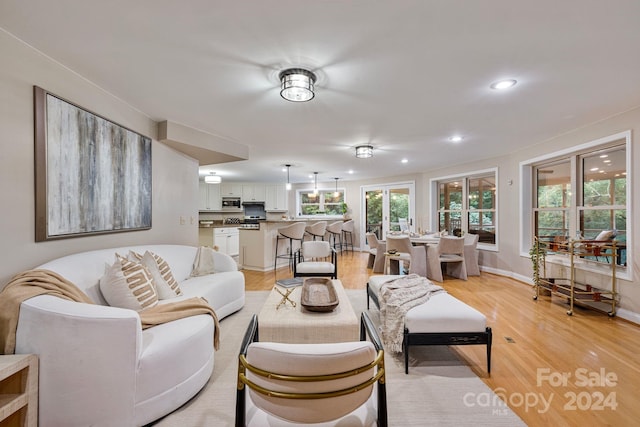 living room featuring light wood-type flooring