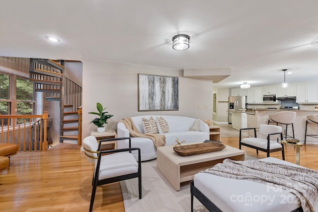 living room featuring light wood-type flooring