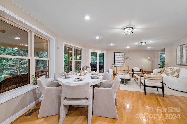 dining room with light hardwood / wood-style flooring