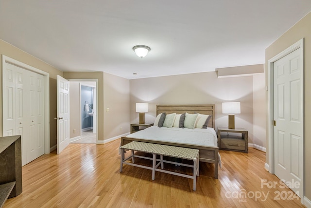 bedroom with light hardwood / wood-style flooring