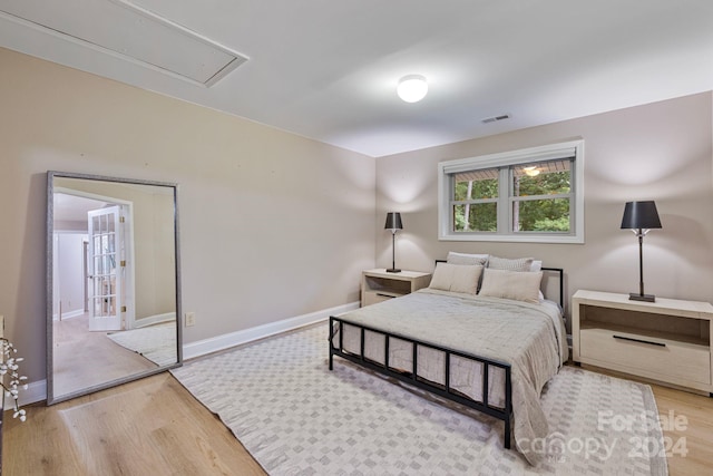 bedroom featuring light wood-type flooring