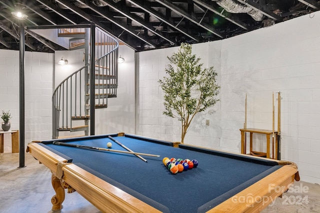 game room with concrete floors and billiards