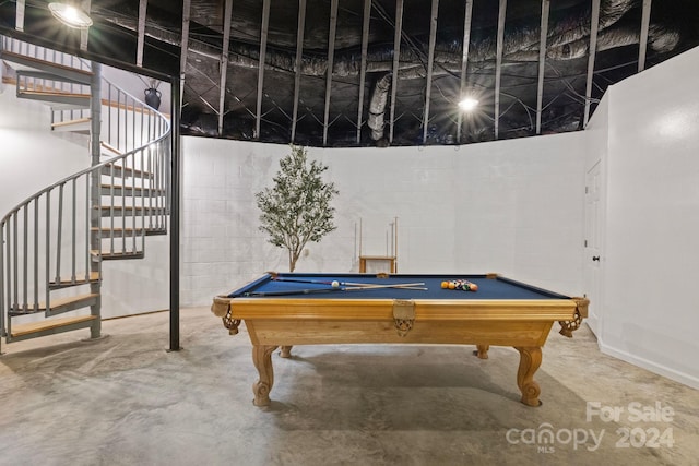 playroom with concrete flooring and pool table