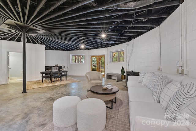 living room featuring concrete flooring