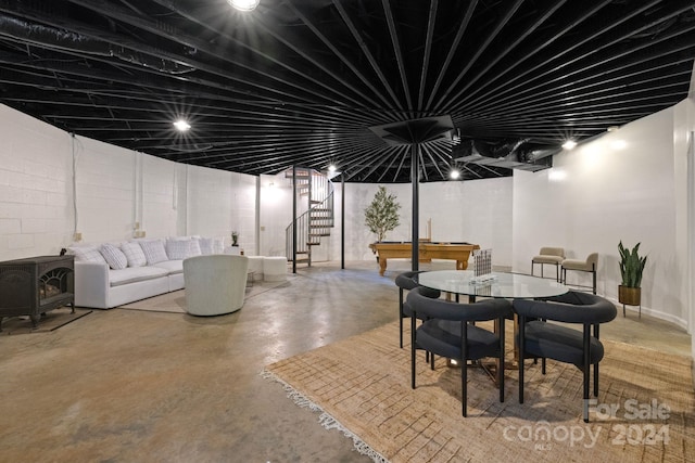 basement featuring a wood stove