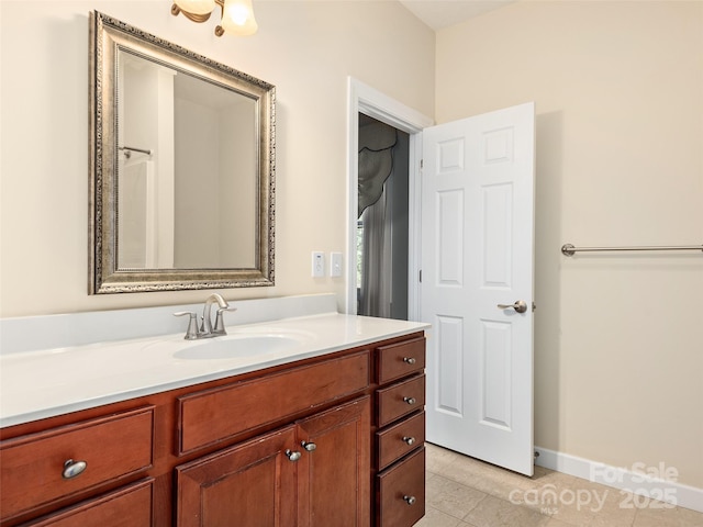 bathroom featuring vanity and tile patterned flooring