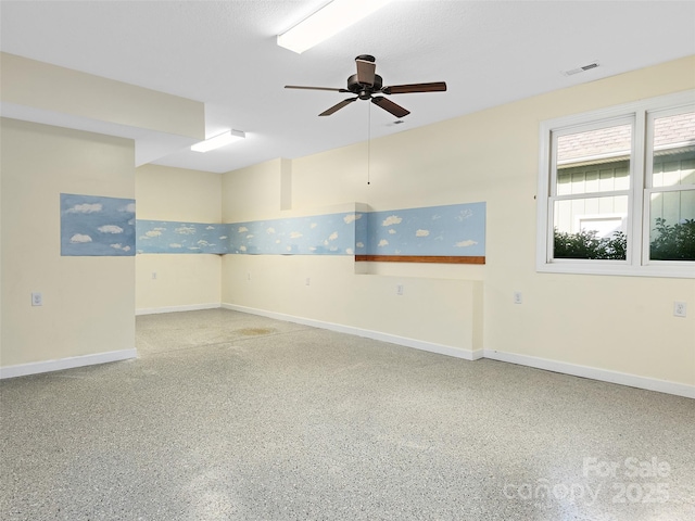 spare room featuring ceiling fan