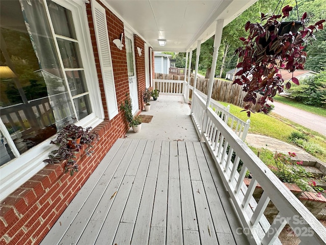 wooden deck featuring a porch