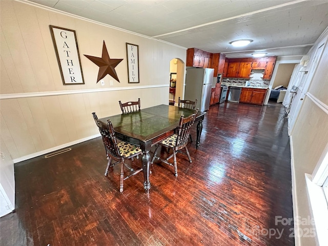 dining room with dark wood-type flooring