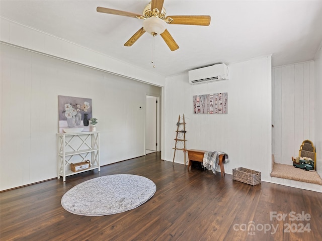 miscellaneous room with ceiling fan, dark hardwood / wood-style floors, and a wall mounted AC