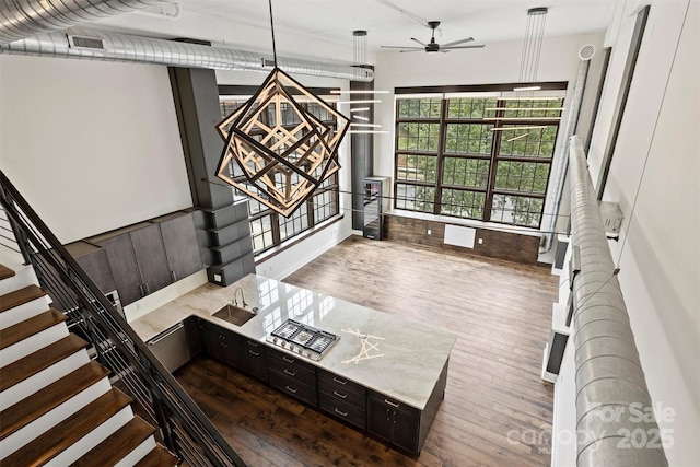 interior space featuring ceiling fan and hardwood / wood-style flooring