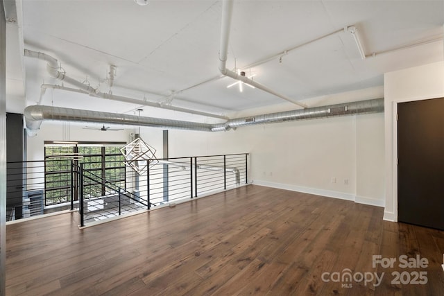 spare room featuring ceiling fan and hardwood / wood-style floors