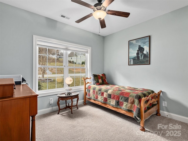 carpeted bedroom featuring ceiling fan