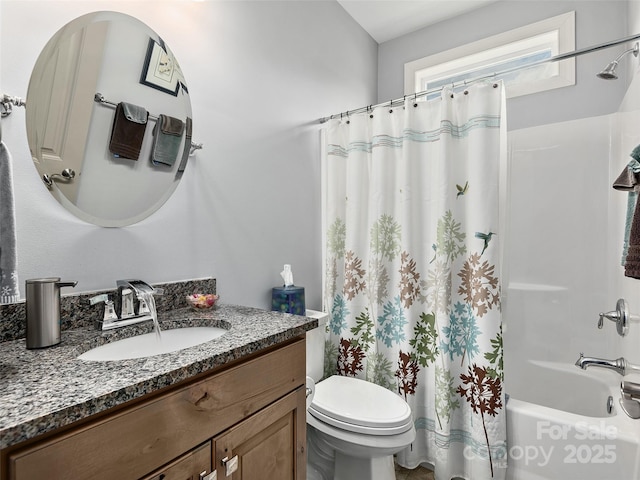 full bathroom with vanity, shower / bathtub combination with curtain, and toilet